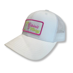 A white trucker-style baseball cap with a mesh back and a rectangular embroidered patch on the front. The patch has a pink border, a white background, and the text 'Bikinis & Margs' in pink and green script.